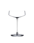 NUDE | Tom Dixon Splash Coupe glass, empty, shown on a plain white background, showing its wide shallow bowl and ripple foot base.