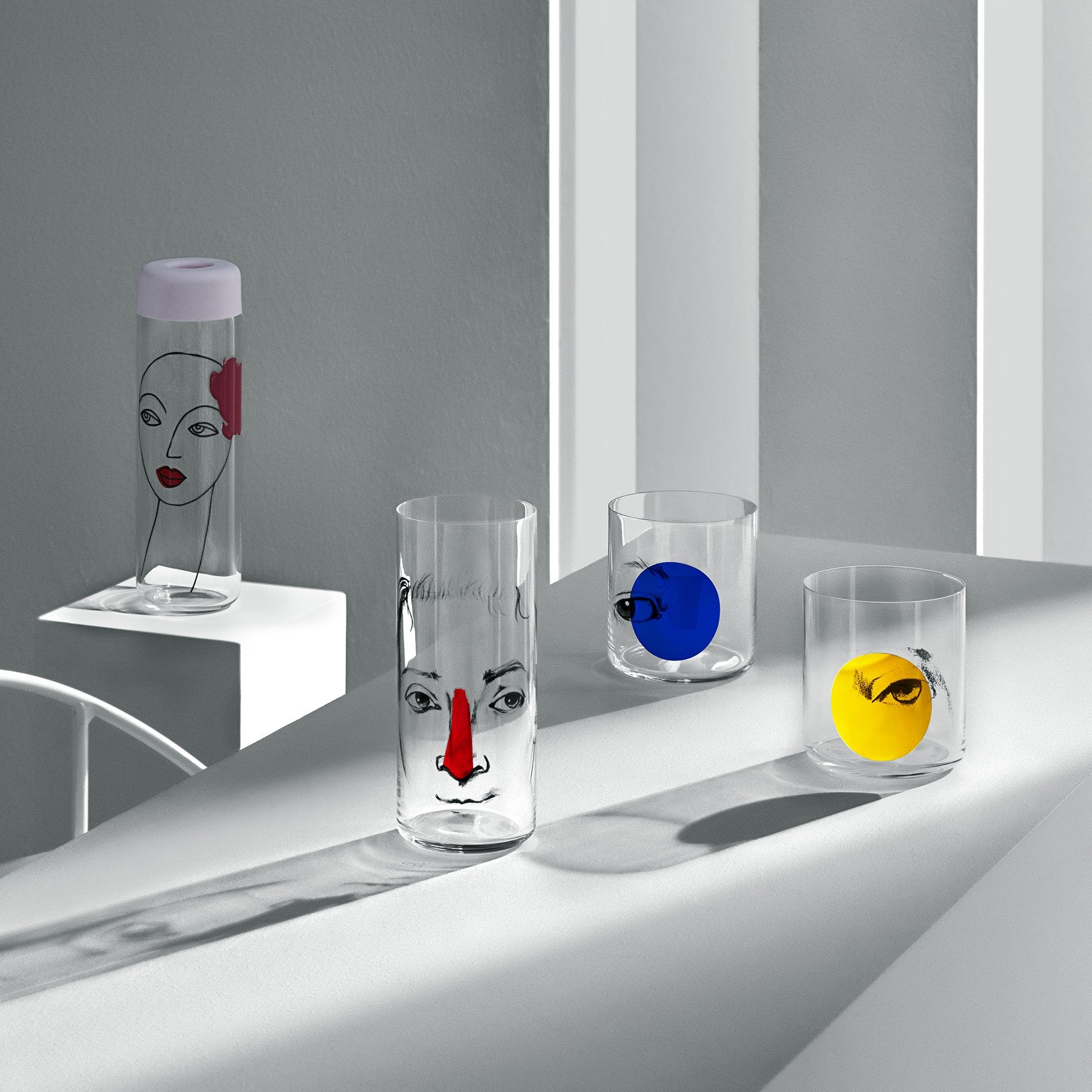 Lifestyle image of Finesse Rock & Pop collection with faceted skull, vases, high ball and whisky glass