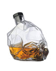 NUDE Memento Mori skull shaped whisky bottle filled side view