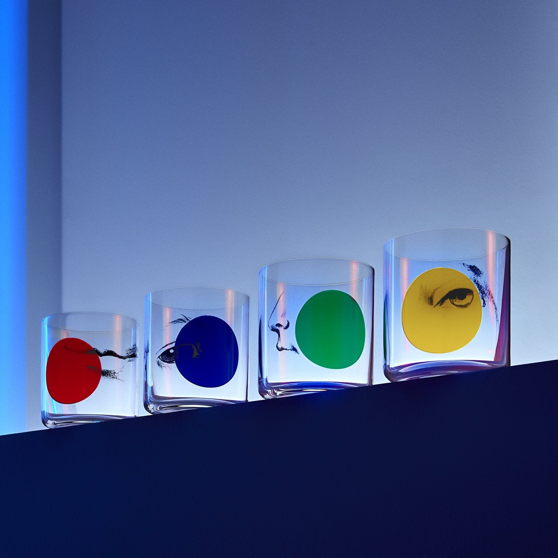 Lifestyle image of NUDE Rock & Pop whisky glasses in neon environment