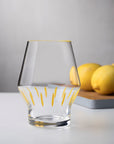 Beak Waterglass Iris Collection Yellow Striped on table setting