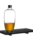 Nude Glas Whisky bottle Tall with wooden tray presented with whisky