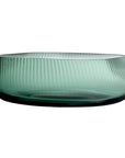 Nude centrepiece by Defne Koz in smoked green