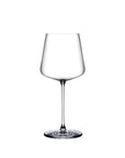 NUDE | Tom Dixon Splash White Wine glass, empty, shown on a plain white background, showing its tapered bowl and ripple foot base.
