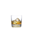 NUDE Ace whisky glass with golf pattern on the bottom filled with whisky